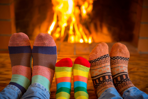 Big sock family near fireplace