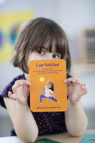 CHILD WITH I AM FULFILLED CARD