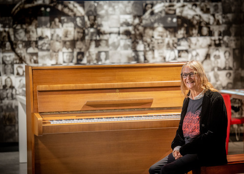 Lennon's sister Julia Baird with piano