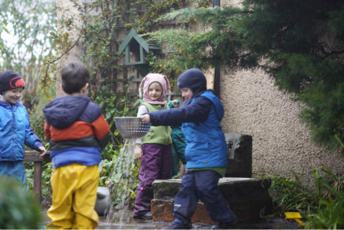 P1-aged pupils playing in Kindergarten