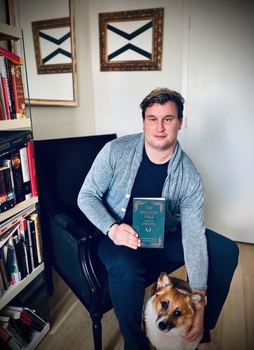 Alexander Paul Burton with his Corgi