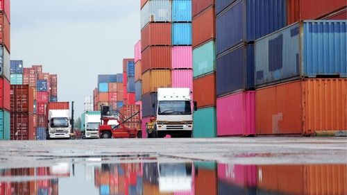 Trucks at a cargo lot Trucks at a cargo lot