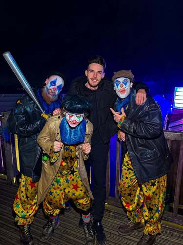 Declan Rice pictured with performers dur