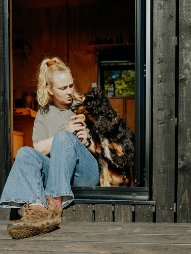 Dog and his owner at a Shacks cabin
