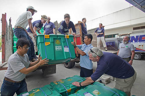 Shelterboxes being loaded for delivery