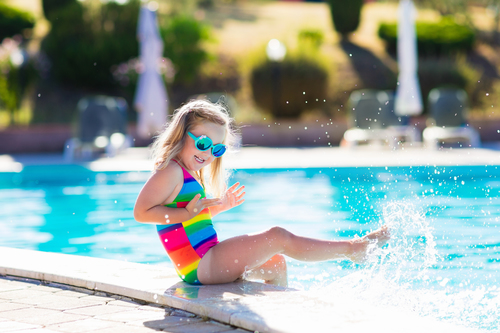 Young girl enjoys the UK sunshine