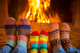 Big sock family near fireplace