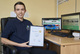 Tom with his NVQ Level 3 Certificate