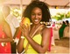 Lady at Mango Festival with a mango